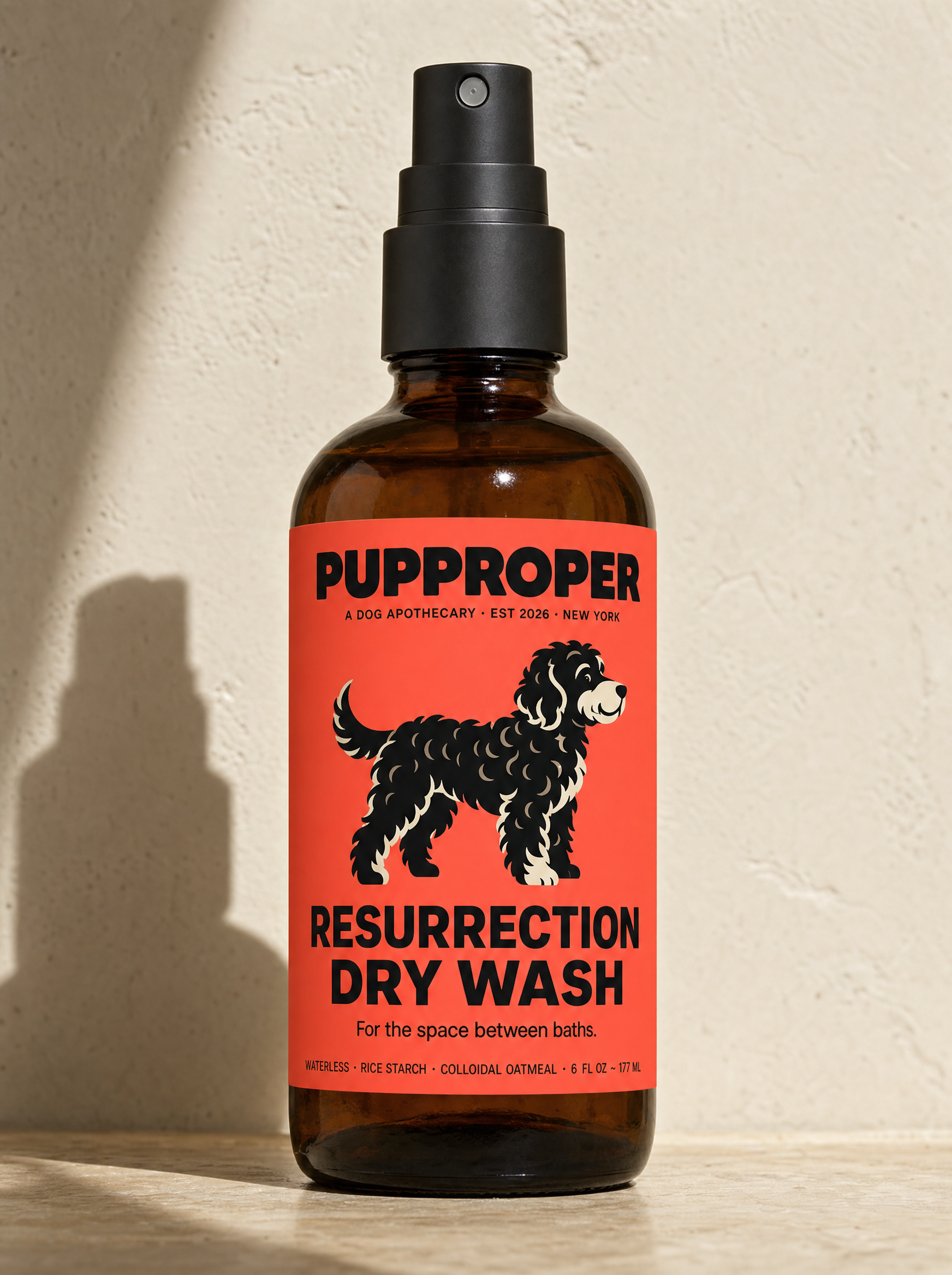 Pupproper Resurrection Dry Wash — amber glass bottle with bright coral label and sitting Labradoodle illustration